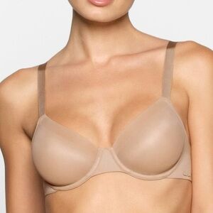 SKIMS no show molded unlined Demi 32B bra in sand NWT